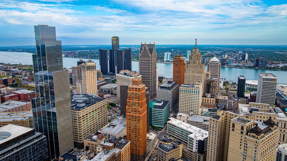 Aerial view of downtown Detroit skyline showing urban buildings and riverfront development
