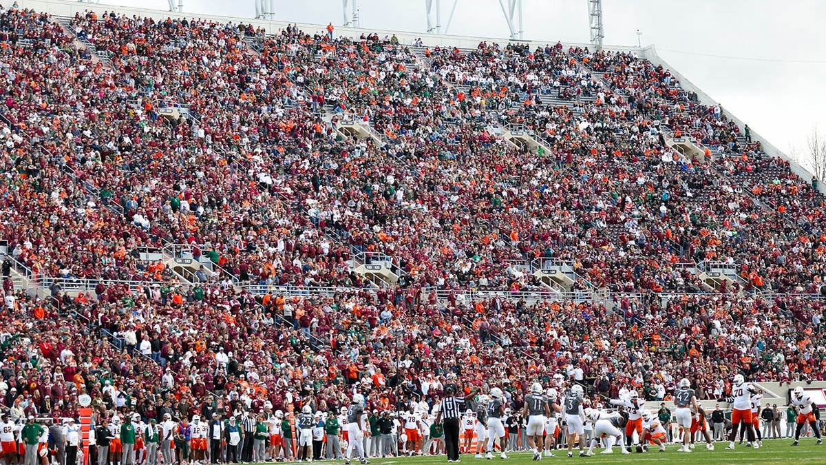 Skydiver Rescued After Getting Stuck on Virginia Tech Scoreboard - Image 4