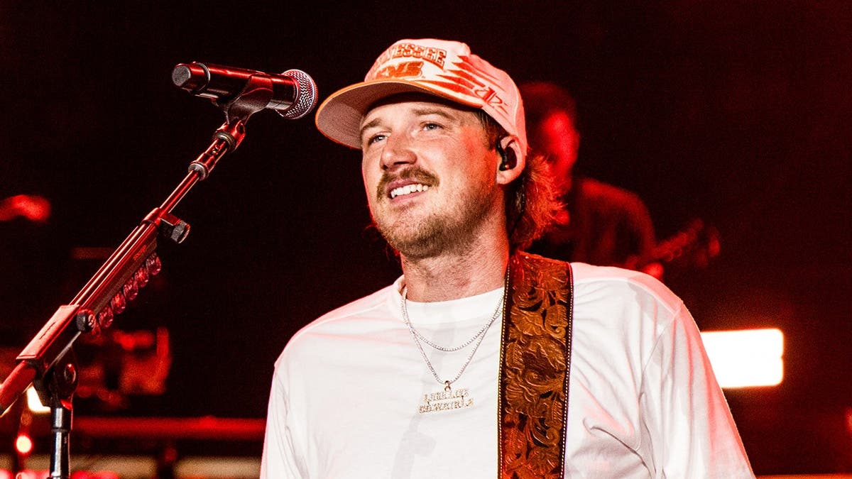Eagles Star Cooper DeJean Joins Morgan Wallen on Stage - Image 5