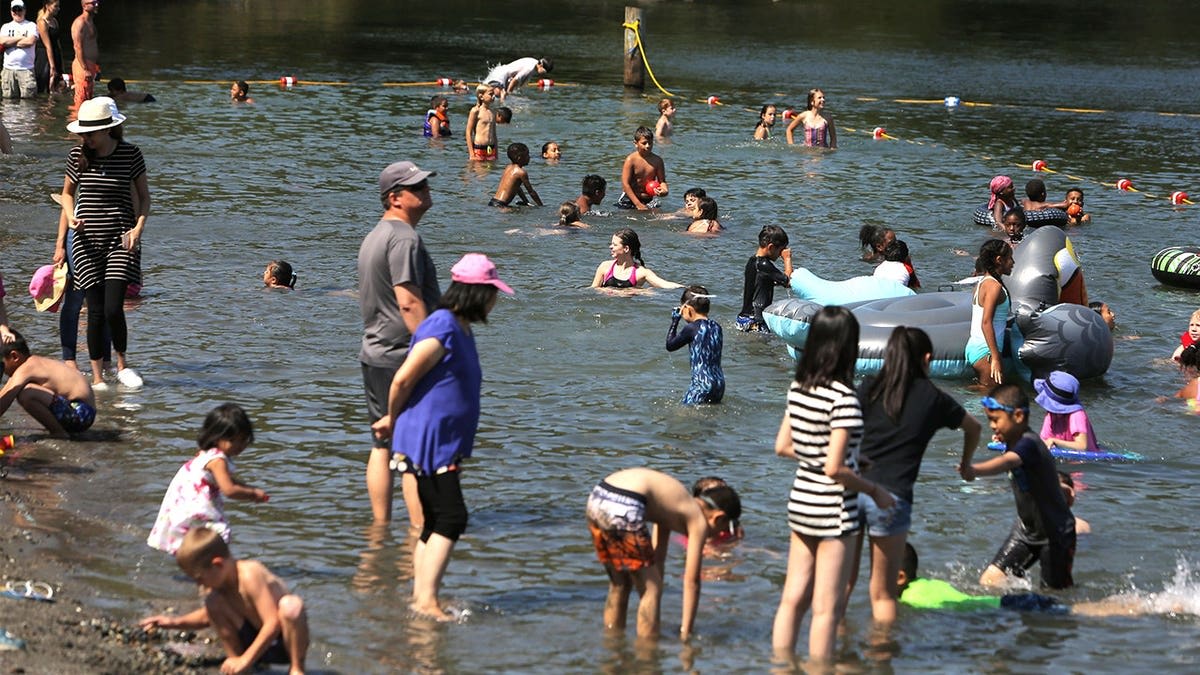 Water Polo Star Saves 3 Girls From Drowning at Seattle Fest - Image 5