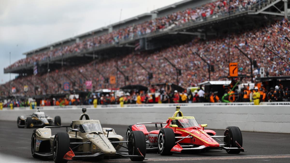 Indy 500's Closest Finish Ever: 220 MPH Side-By-Side Duel - Image 3