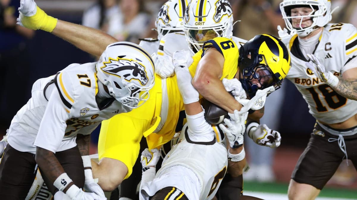 Michigan quarterback Bryce Underwood throwing winning Hail Mary touchdown pass to JJ Buchanan