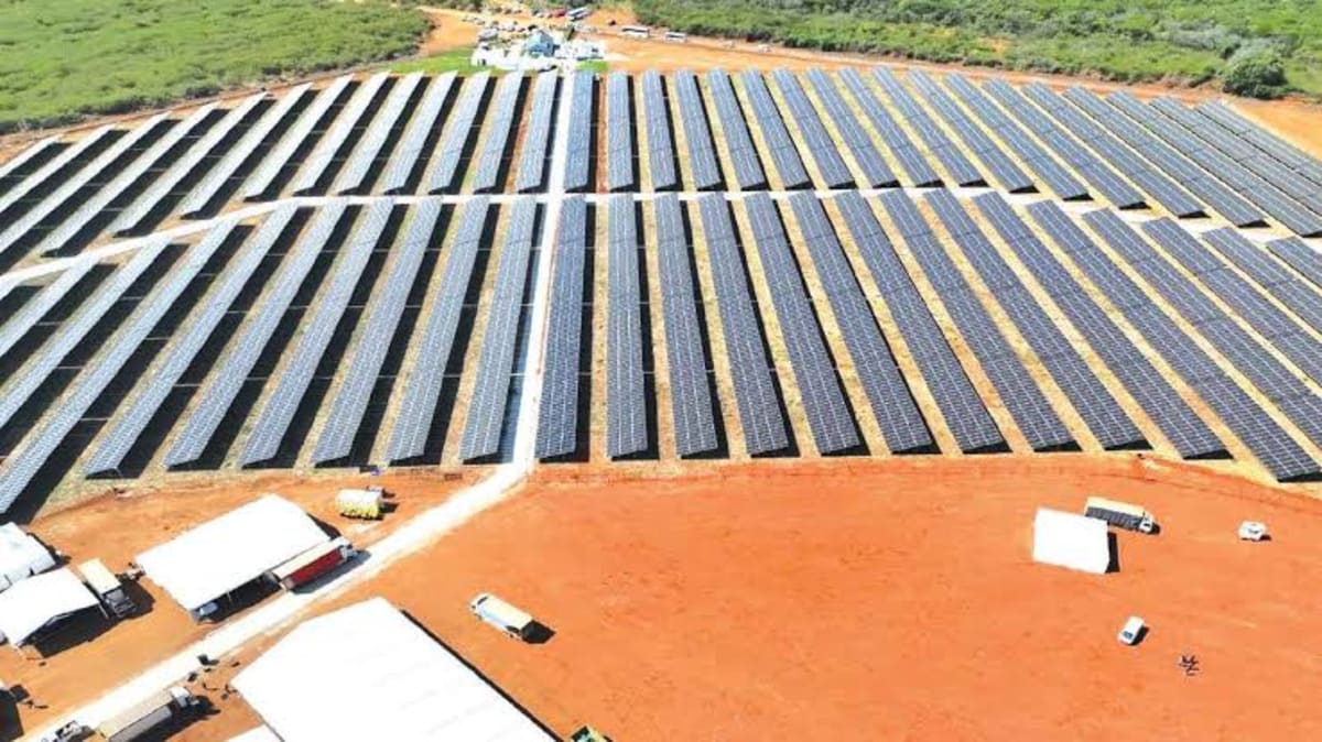Aerial view of floating solar panels on blue water surface of Lake Kariba, Zimbabwe