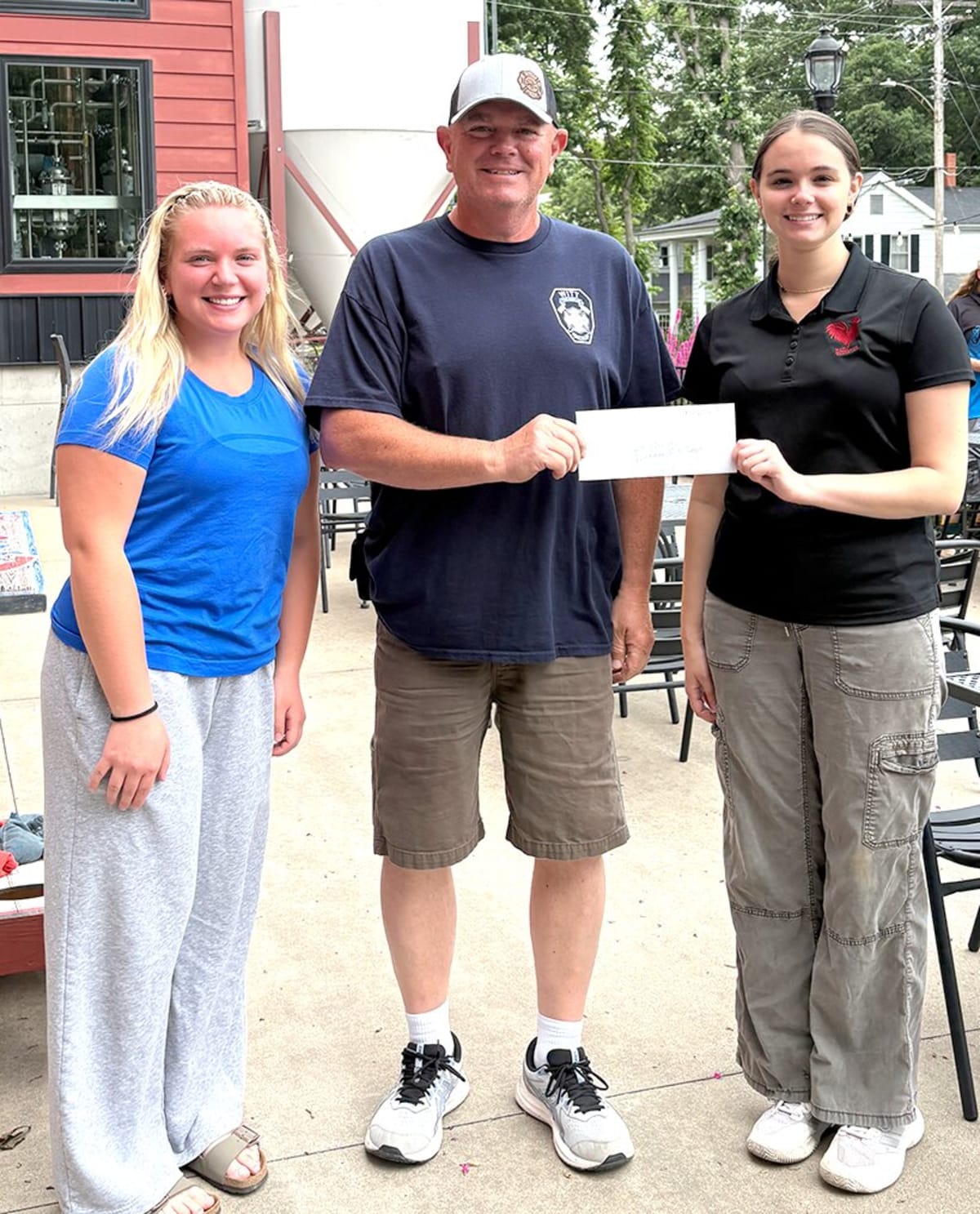 Red Rooster tap room exterior in Hillsboro, Illinois supporting local volunteer firefighters