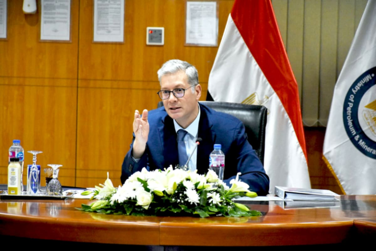 Egyptian petroleum facility with oil and gas infrastructure against clear blue sky