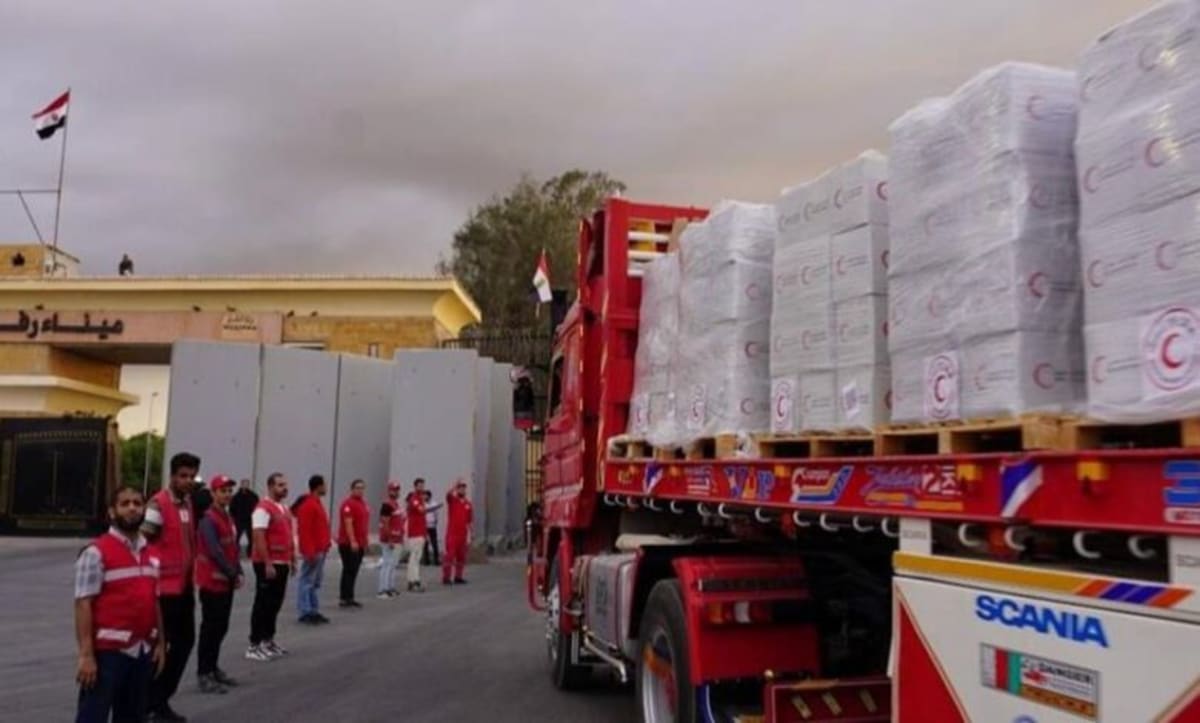 Egyptian medical workers providing healthcare services to elderly residents at care home in Giza