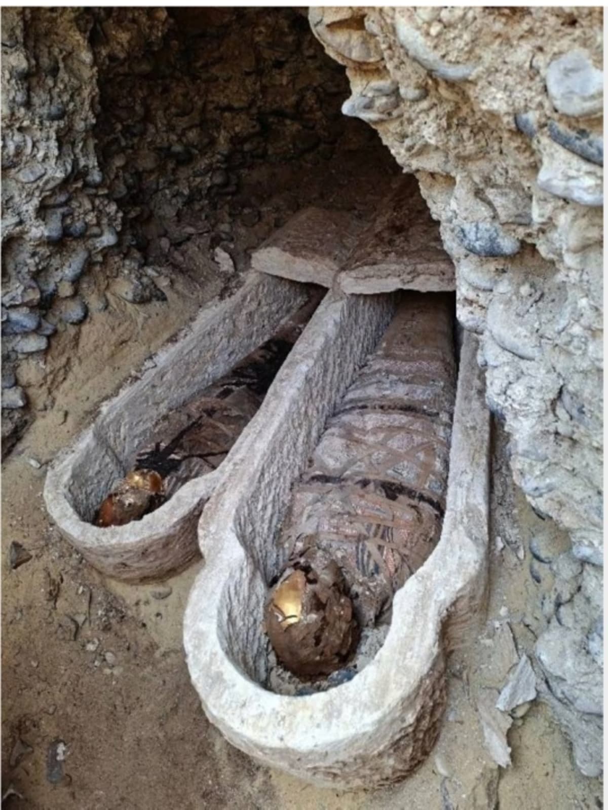 Ancient Roman mummy wrappings with geometric patterns discovered in Egyptian tomb excavation