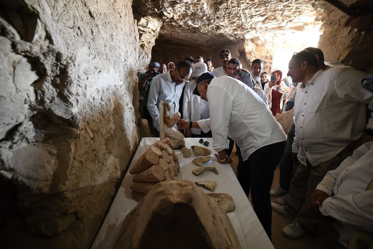Ancient wooden Egyptian coffins with hieroglyphic inscriptions discovered in Luxor archaeological excavation