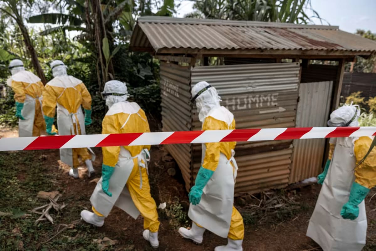 Medical staff in protective equipment working at Ebola treatment facility in Democratic Republic of Congo