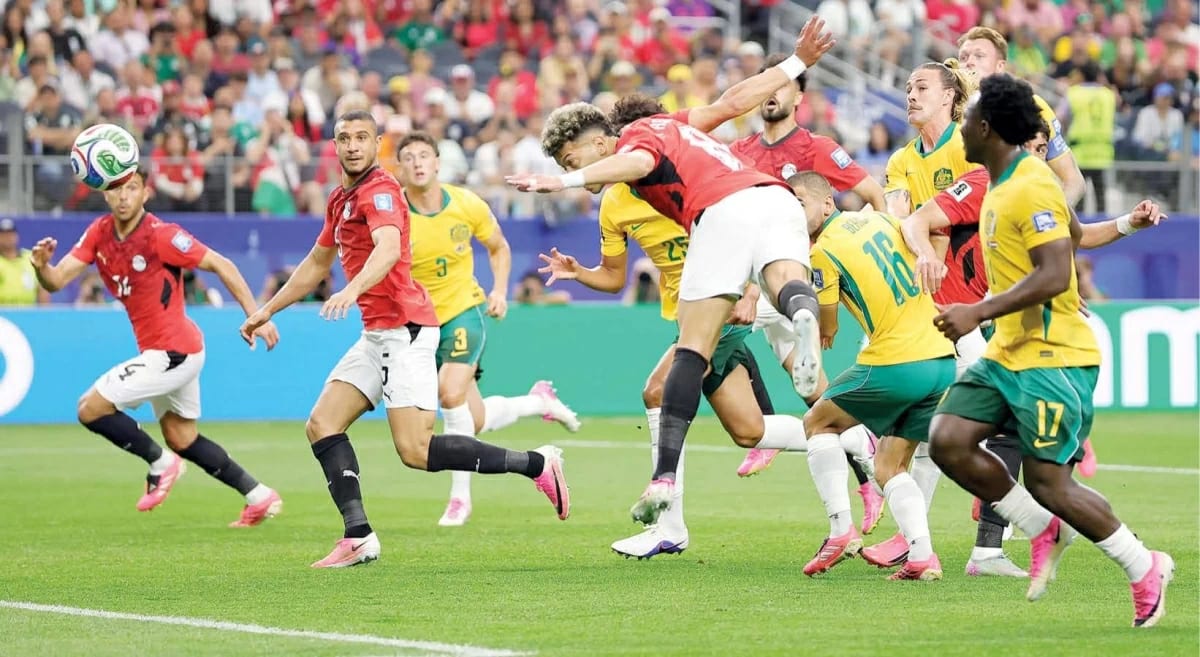 Egyptian soccer players celebrating penalty shootout victory over Australia at 2026 World Cup