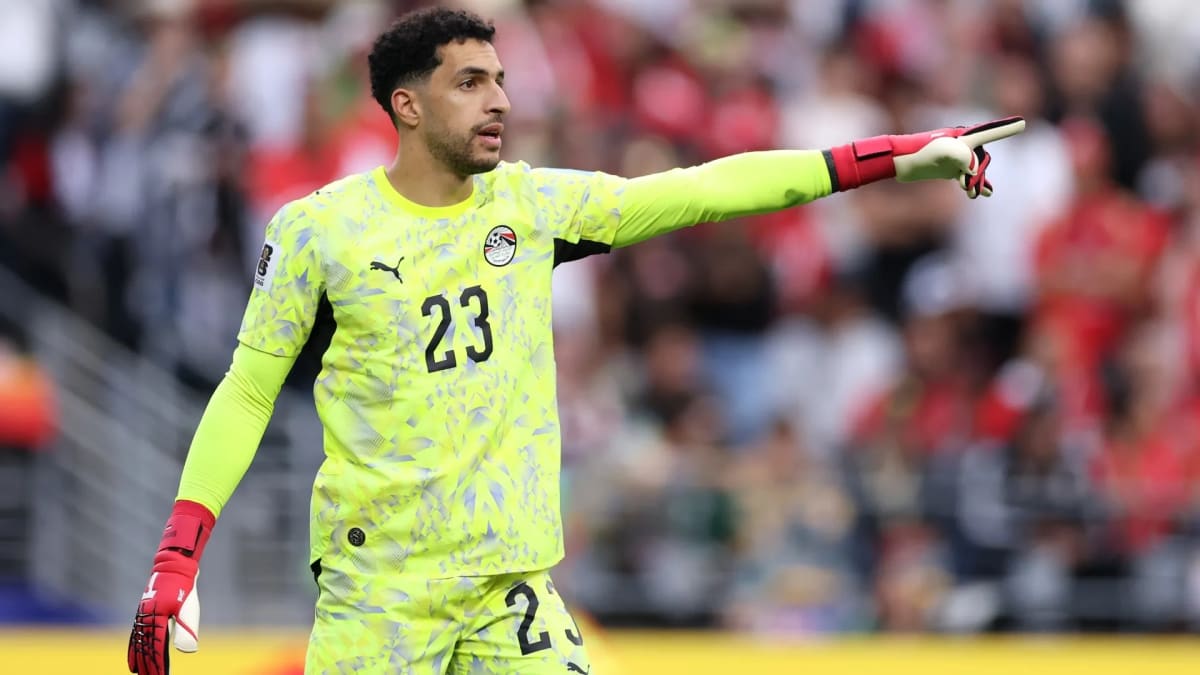 Egyptian goalkeeper Mostafa Shobeir making a save during World Cup match against Argentina