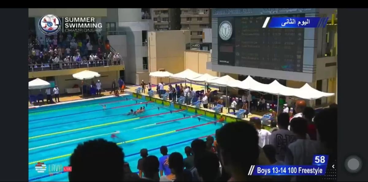 Young swimmer Adam Mohamed Refaat rescuing unconscious competitor during Alexandria swimming championship race