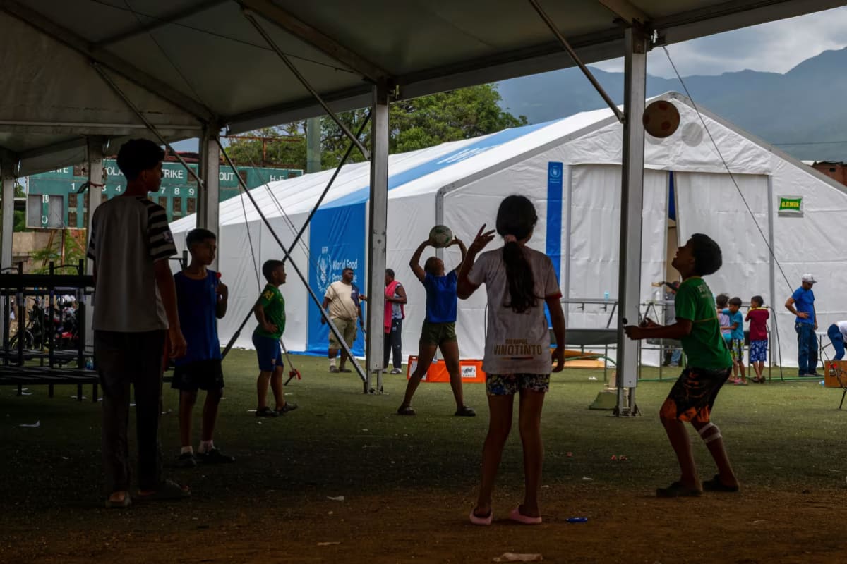 ** Children playing soccer at temporary shelter in Venezuela after earthquakes