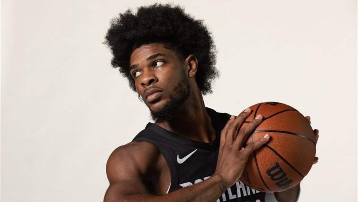 Portland Trail Blazers guard Scoot Henderson dribbling basketball during NBA game action