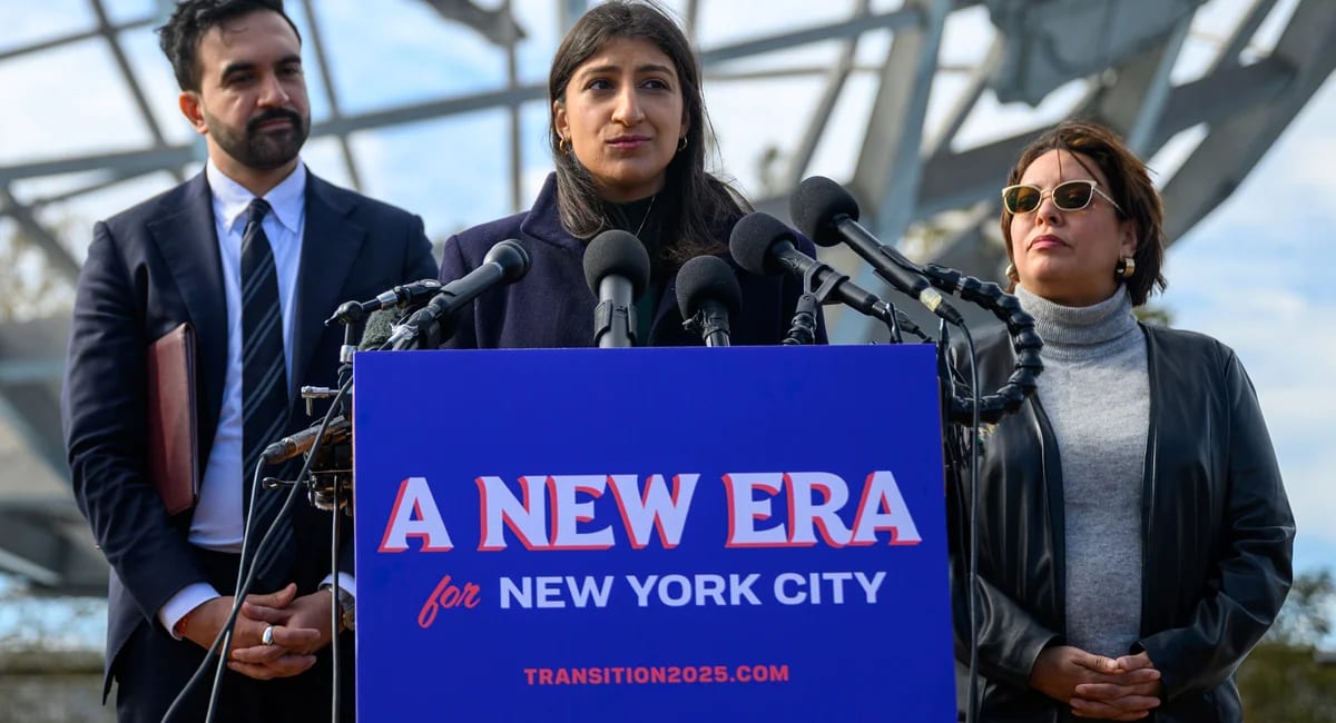 Lina Khan speaking at New York City Hall podium during economic development announcement