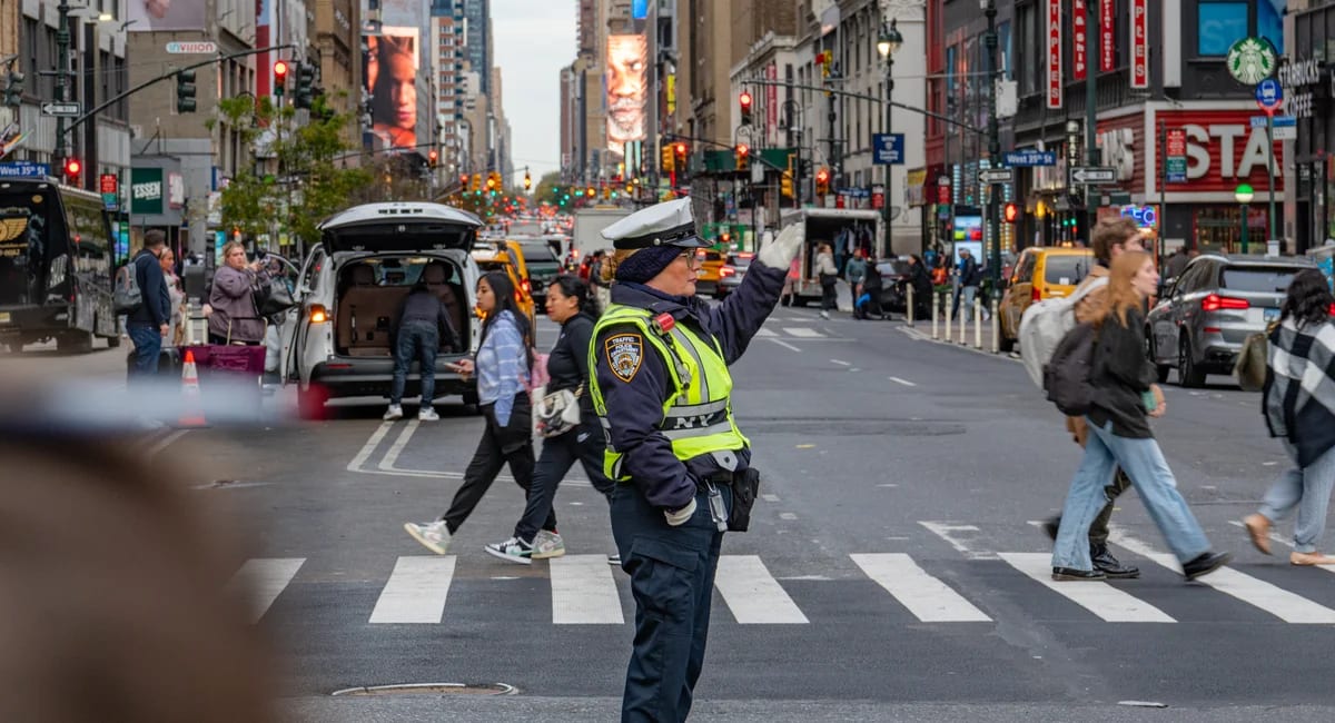 New York City municipal workers celebrating expanded scholarship opportunities for undergraduate education