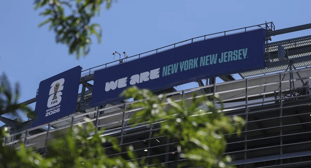 MetLife Stadium exterior with World Cup banners and crowds gathering for matches