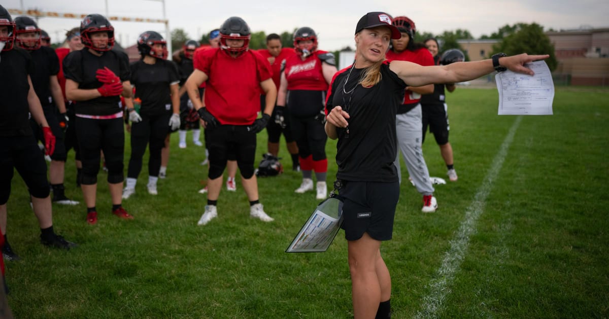 Minnesota Vixen quarterback Erin Kelley celebrates historic first championship victory with teammates