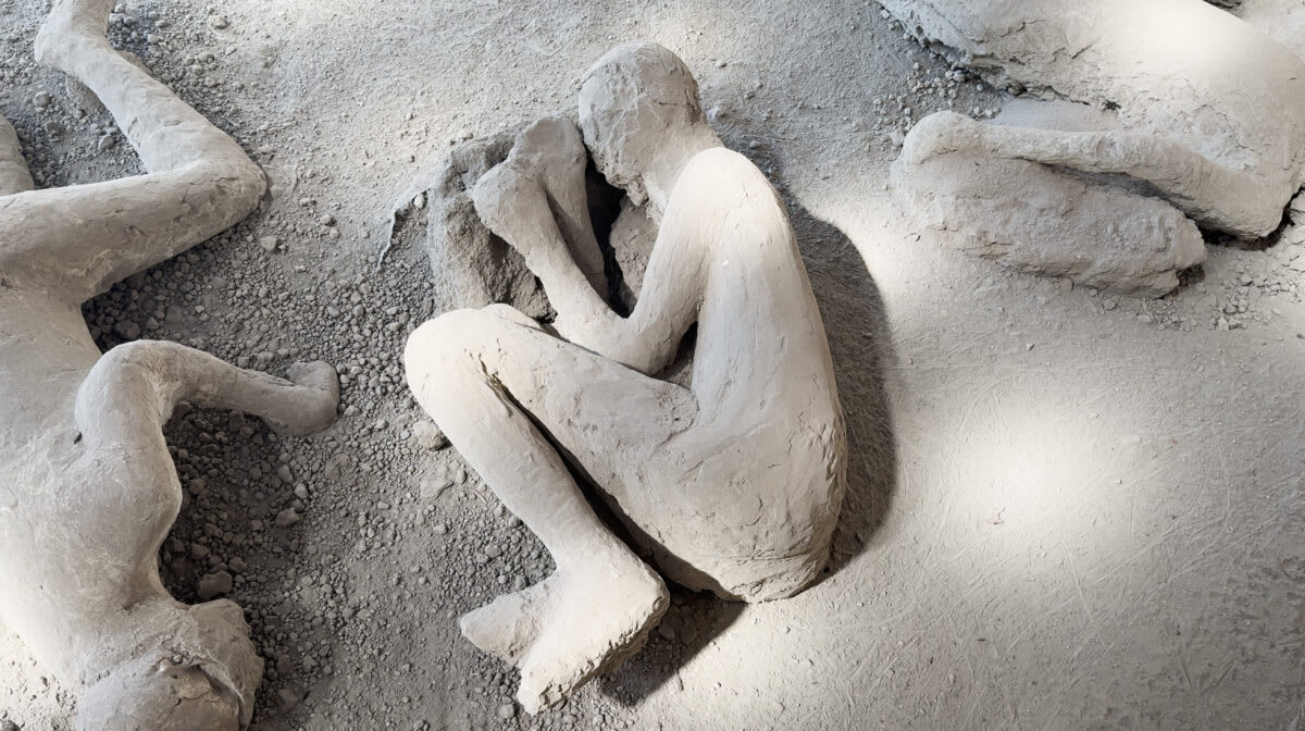 Plaster cast of Pompeii victim with medical instruments discovered inside using CT scanning technology