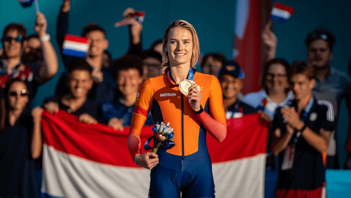 Dutch speed skater Jutta Leerdam celebrating gold medal victory on Olympic ice in Milan