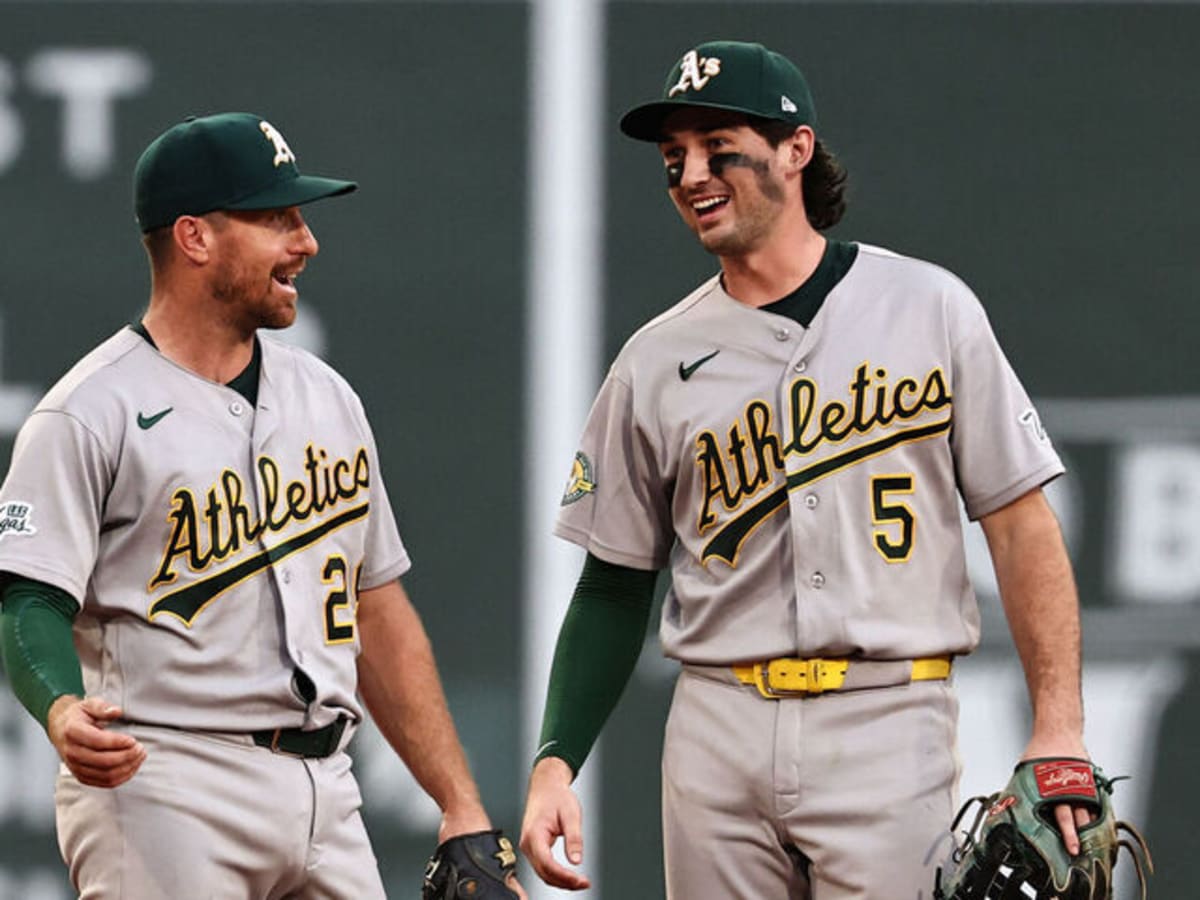 Oakland Athletics shortstop Jacob Wilson fielding a ground ball during game at Fenway Park