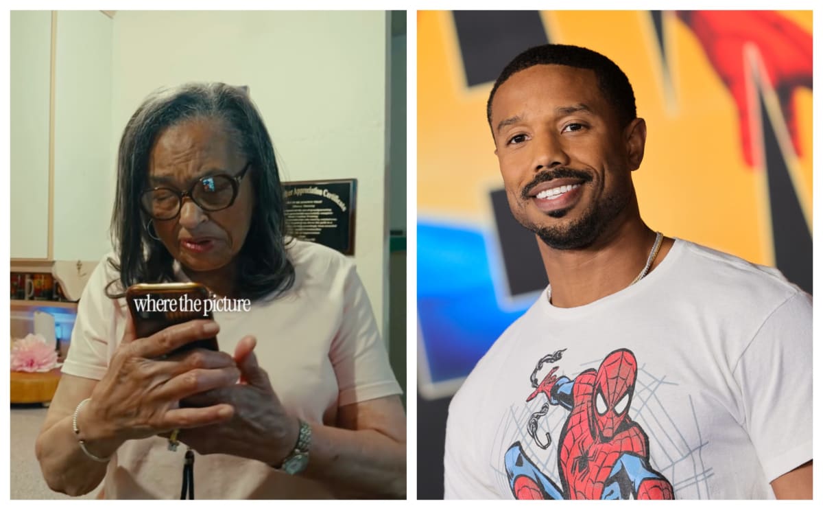 Mary Story smiling beside her family photo wall featuring Michael B. Jordan's picture