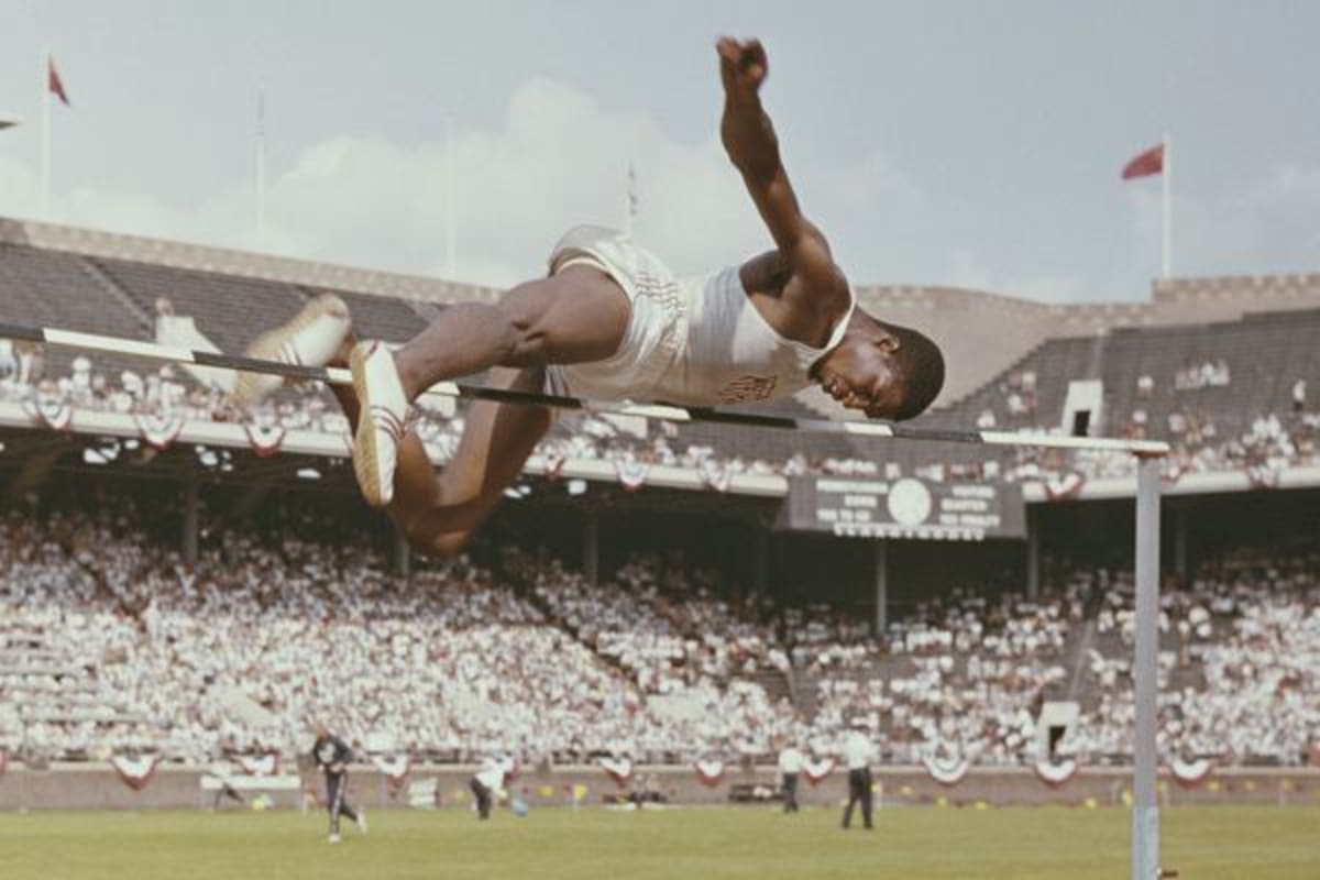 Charles Dumas clearing the high jump bar at 1956 Olympic Trials in Los Angeles