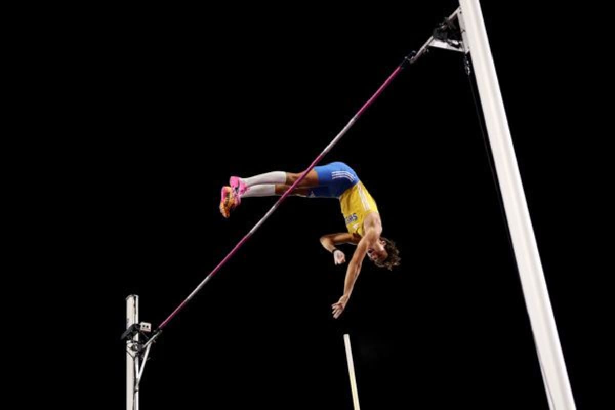 Amy Hunt celebrating with British flag after winning fourth gold medal at Birmingham European Championships
