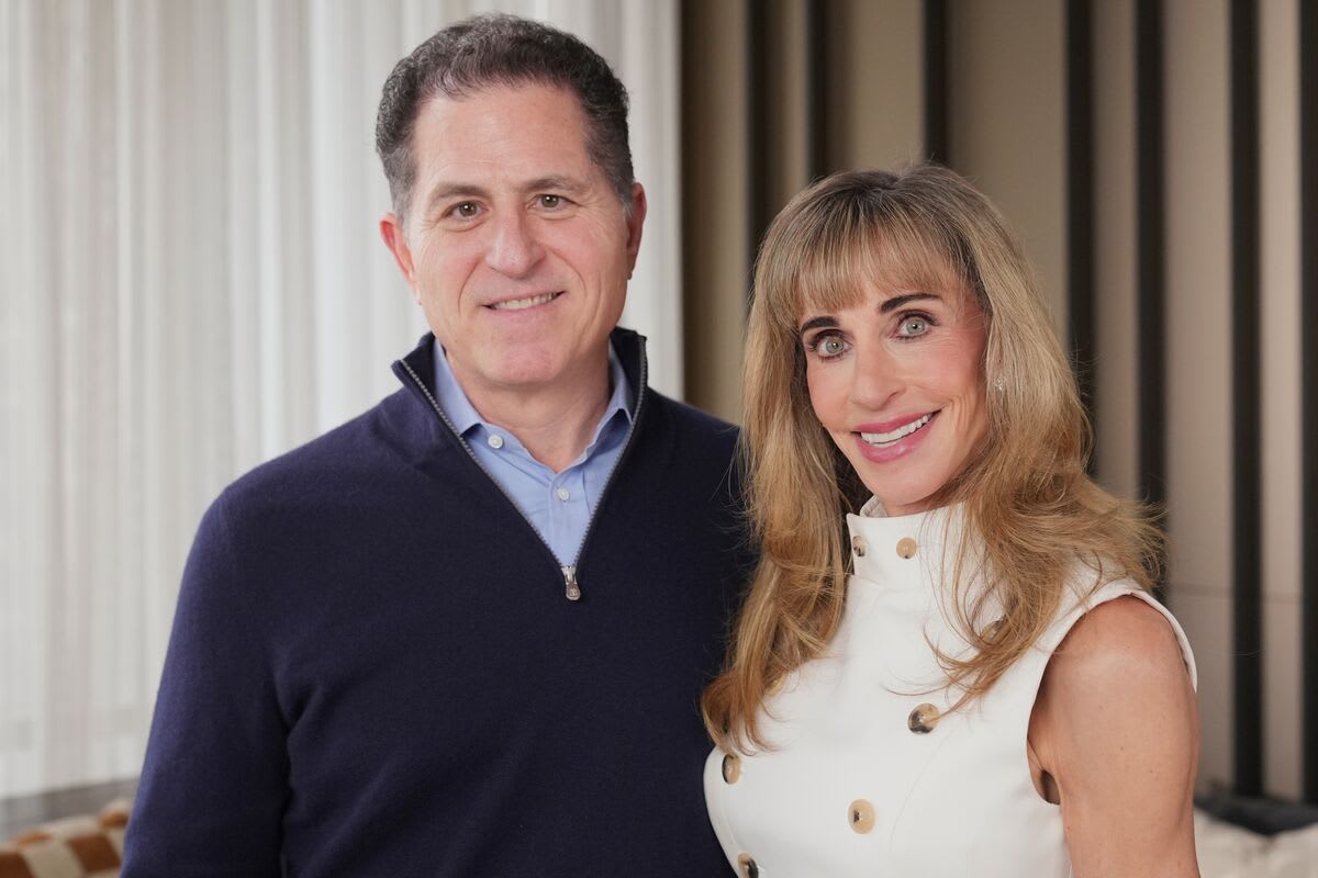 Michael and Susan Dell smiling together at a philanthropic event