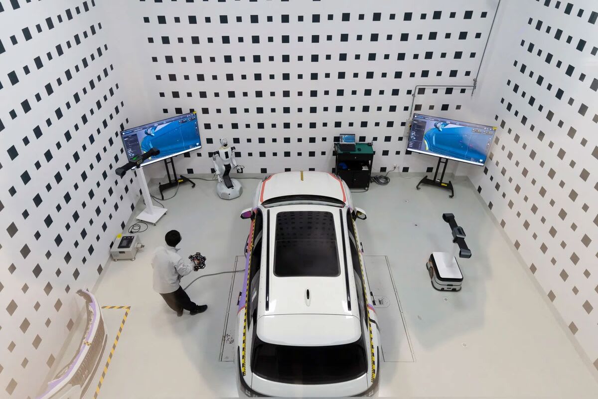 Modern electric vehicle testing facility in Ningbo, China, with precision measurement equipment
