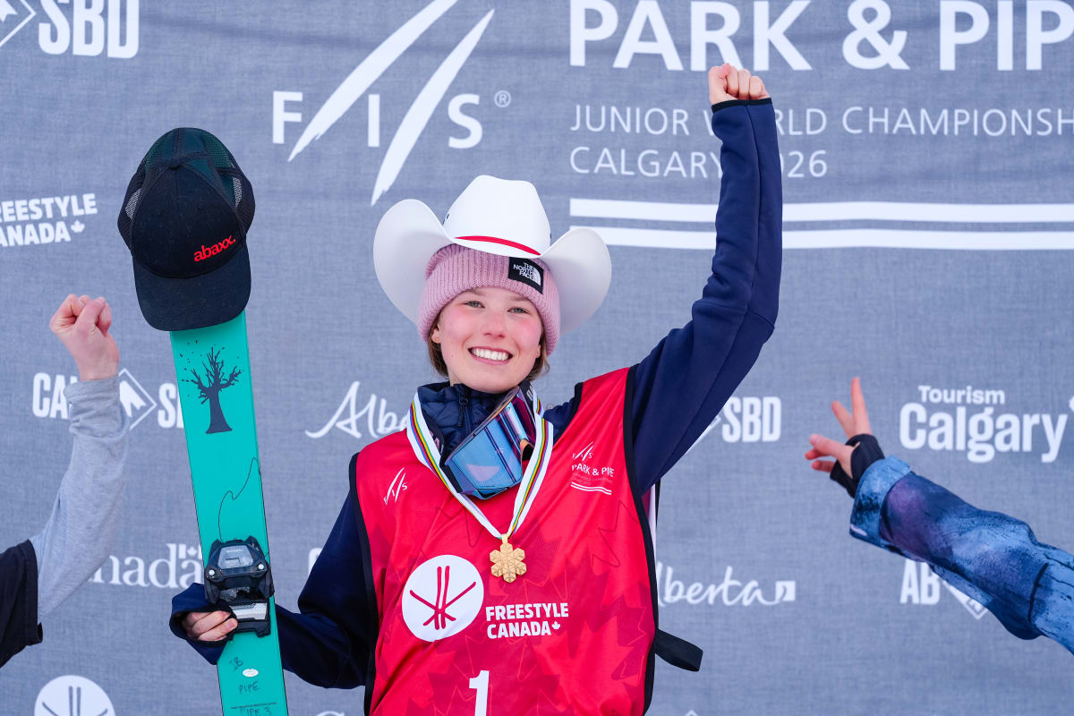 Teen freeskier Indra Brown celebrates on podium with gold medal at Junior World Championships