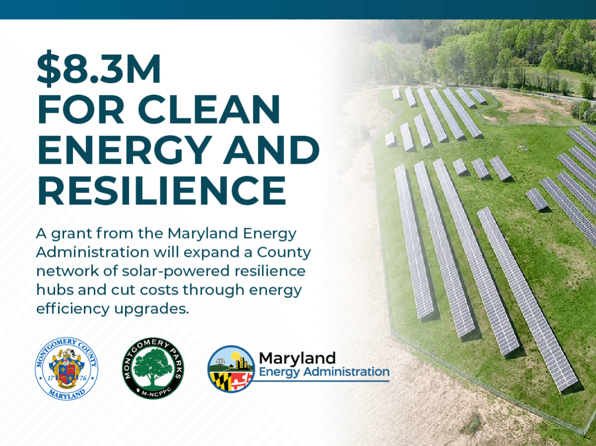 Solar panels installed on roof of community recreation center with blue sky background