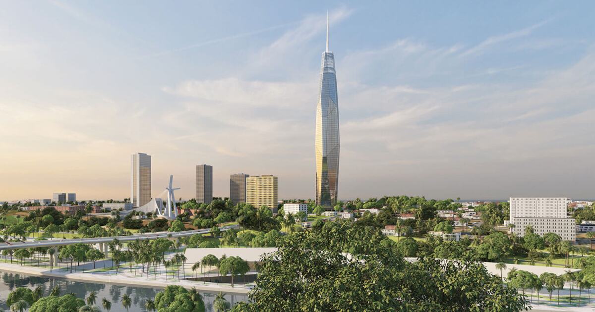 Tall modern skyscraper with symmetrical mask-inspired design rising above Abidjan, Ivory Coast skyline