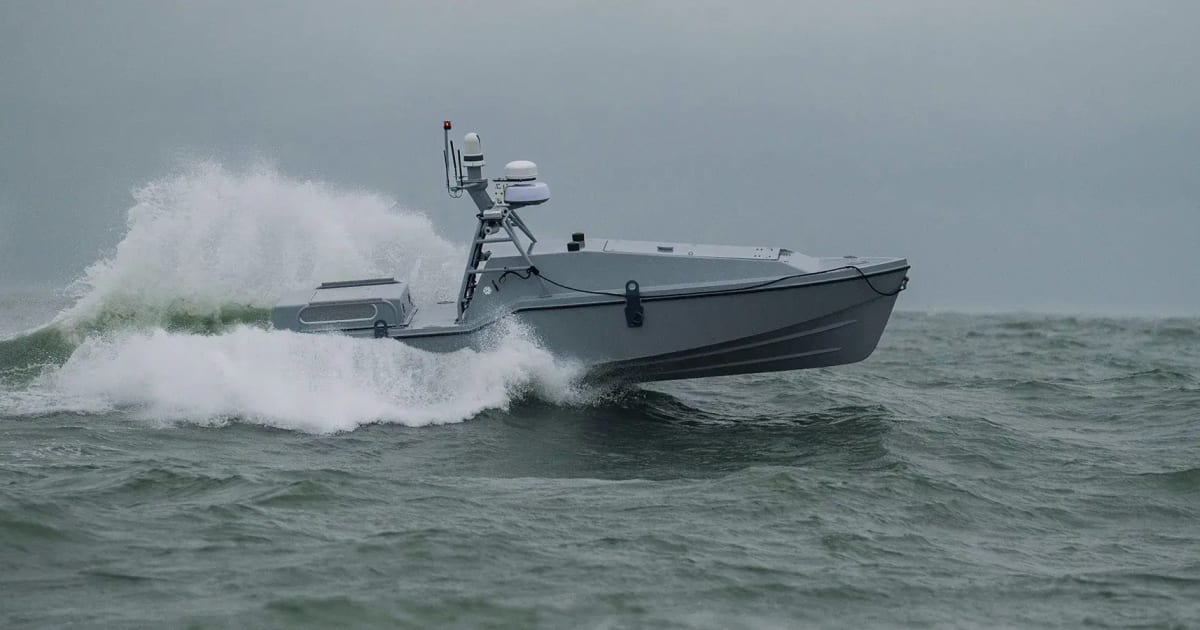 Saronic Corsair autonomous drone boat on water with sensors and equipment visible
