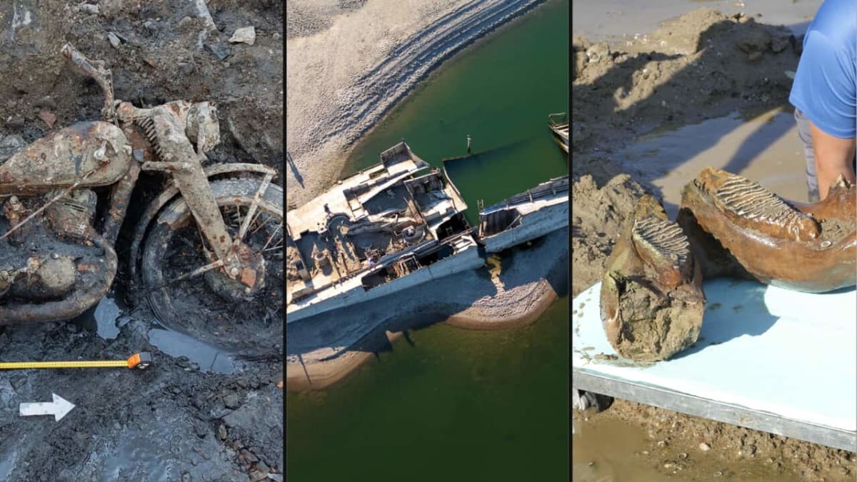 Rusted hull of World War II German warship emerging from low water levels in Danube River