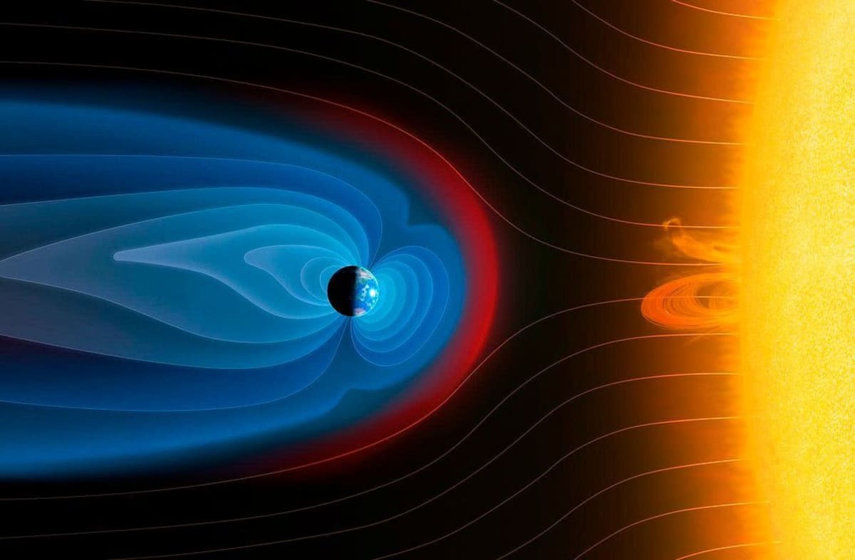 Earth's blue magnetosphere colliding with red solar wind shock wave in space illustration