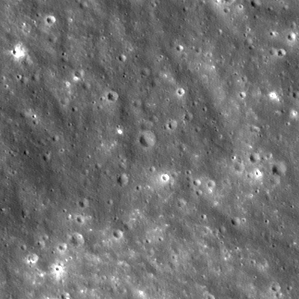 ** Before and after images showing new sixty-foot crater on Moon's surface from spacecraft impact