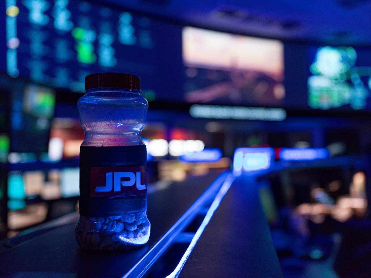 Container of peanuts sitting on desk at NASA JPL mission control before Artemis II launch