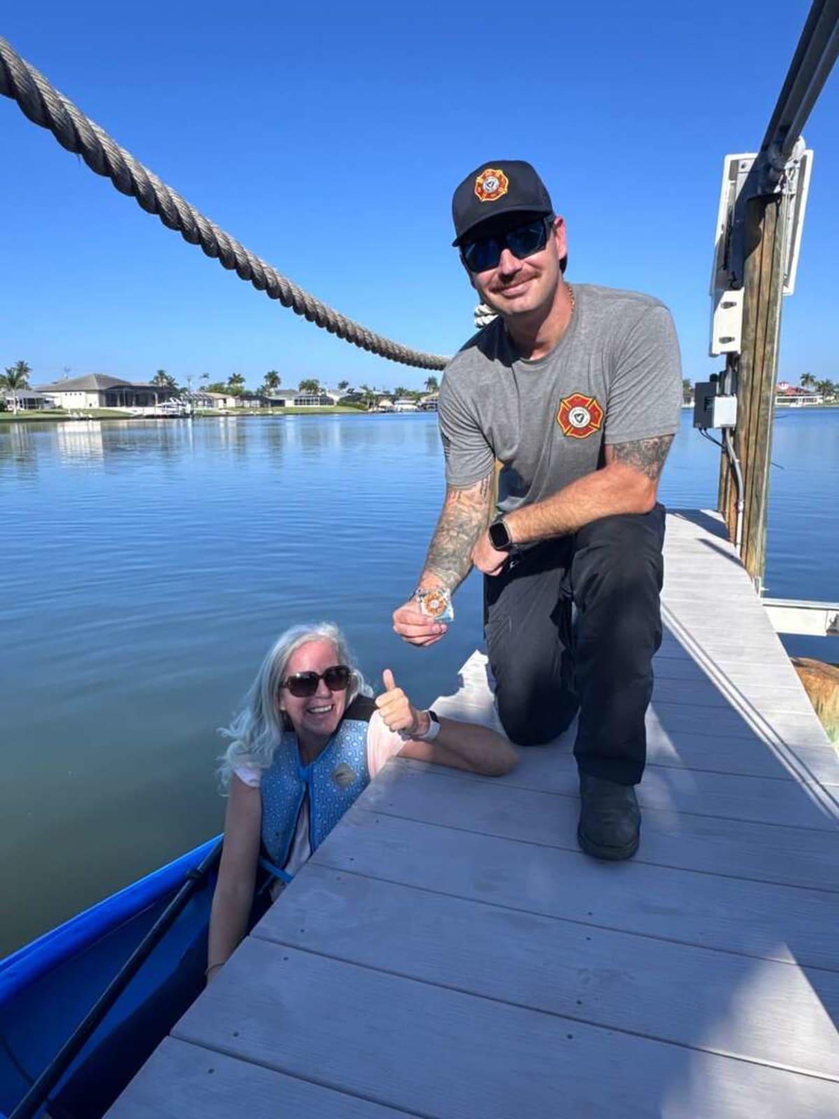 Florida Firefighters Rescue Drowning Coyote Pup From Lake - Image 3