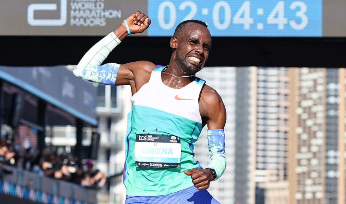 Addisu Gobena sprinting to victory at the Sydney Marathon finish line in record time