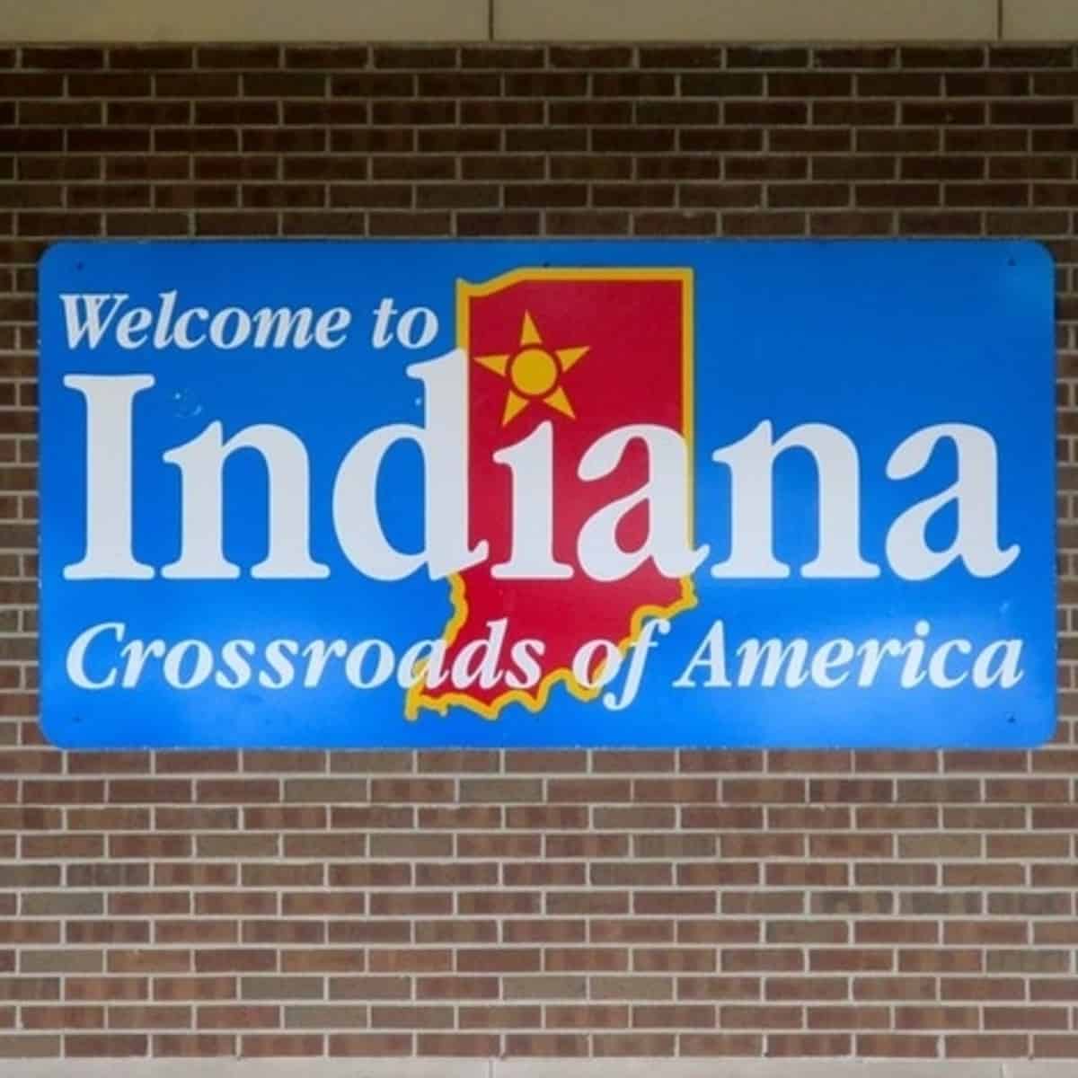 New residential homes under construction in Indiana neighborhood with construction workers on site