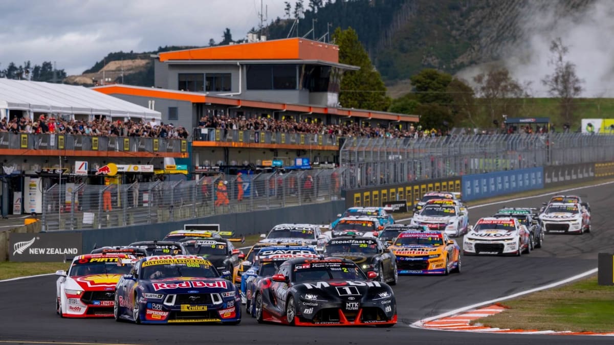 Supercars racing on New Zealand track during inaugural Double Header motorsports event