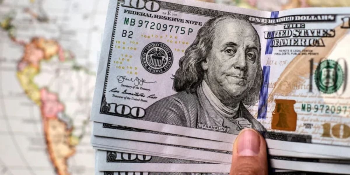 US dollar bills representing the billions in remittances sent to Ghana annually by diaspora