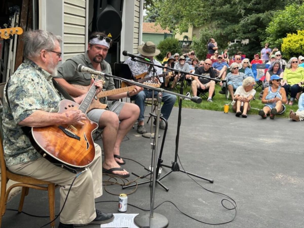 ** Volunteers and musicians gather on residential porches for Bowling Green's annual free music festival