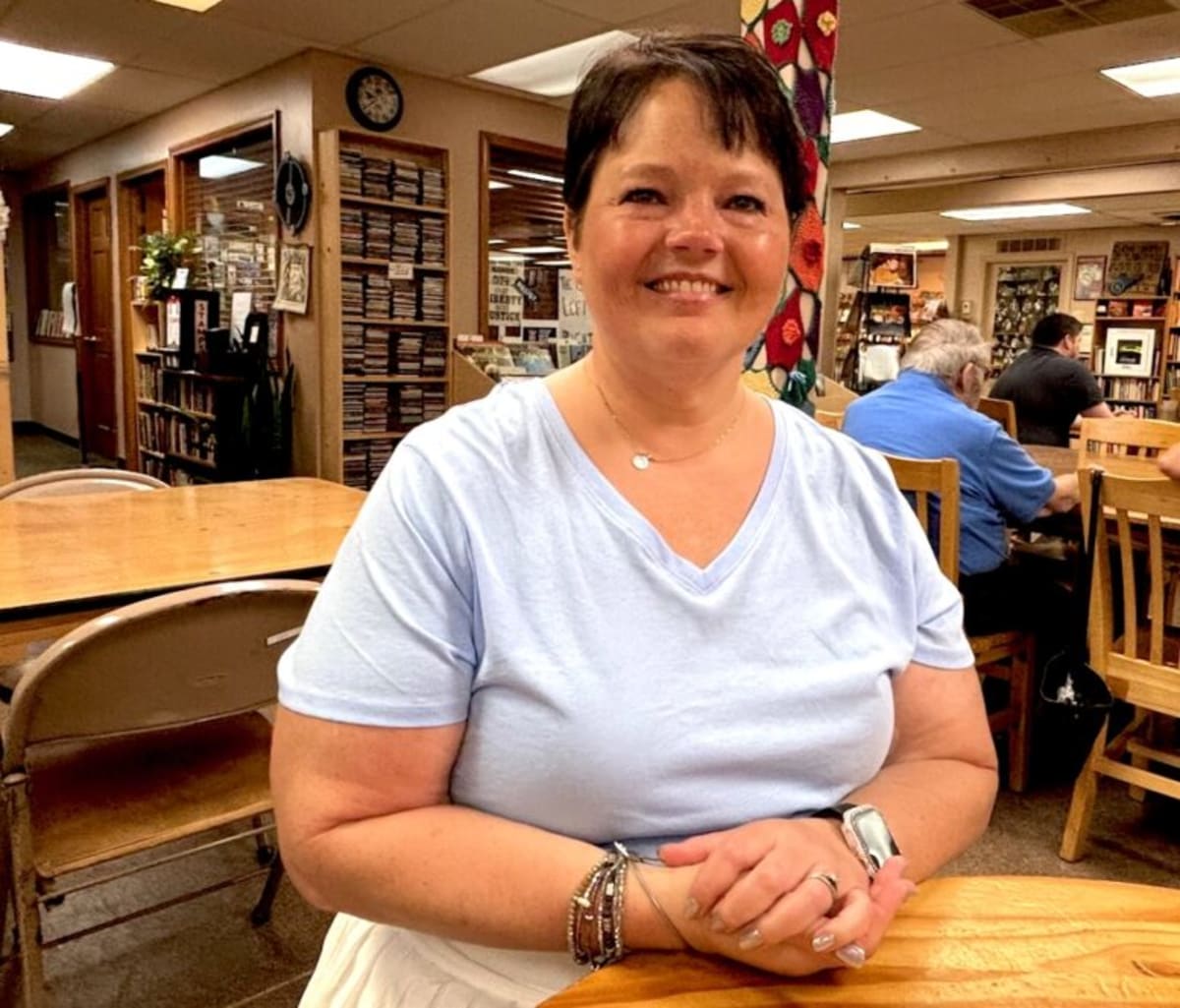 Cancer nurse navigator Sara Hackler smiling in medical scrubs at Wood County Hospital