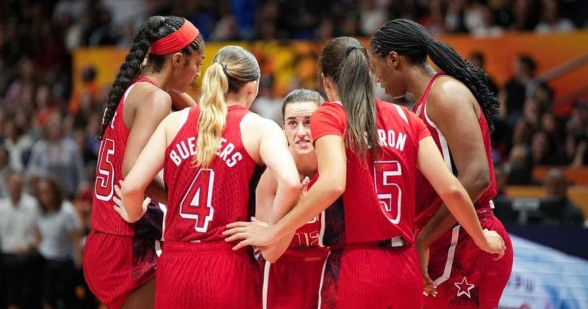Team USA women's basketball players huddle together during FIBA World Cup game in Berlin