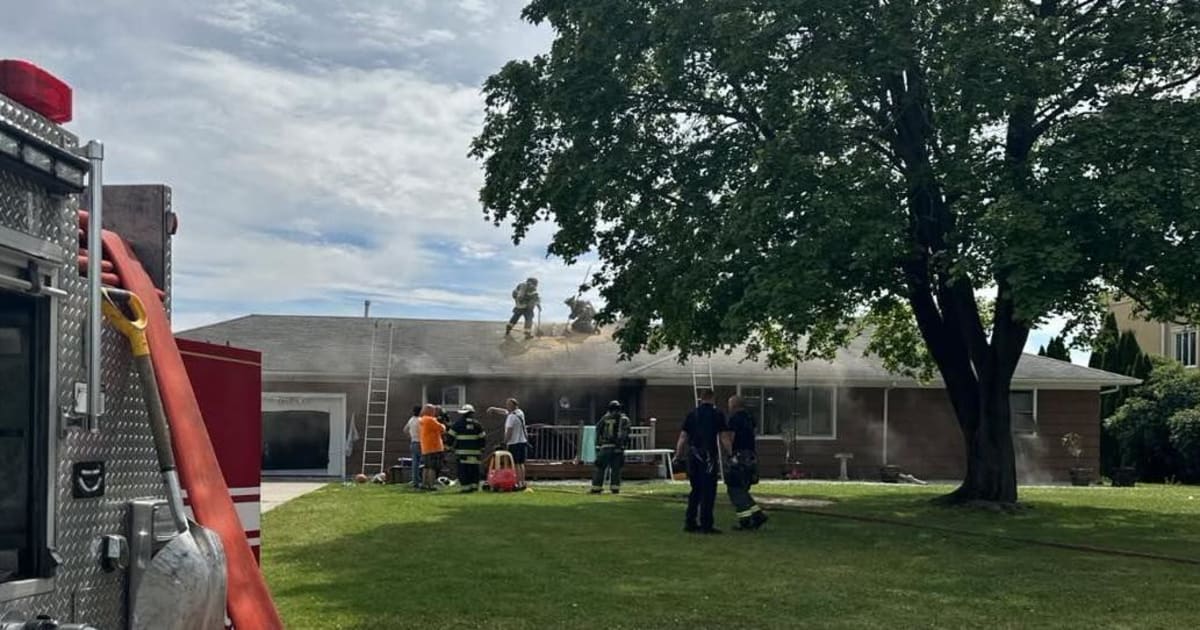 Officer and Neighbor Save Five Trapped in House Fire