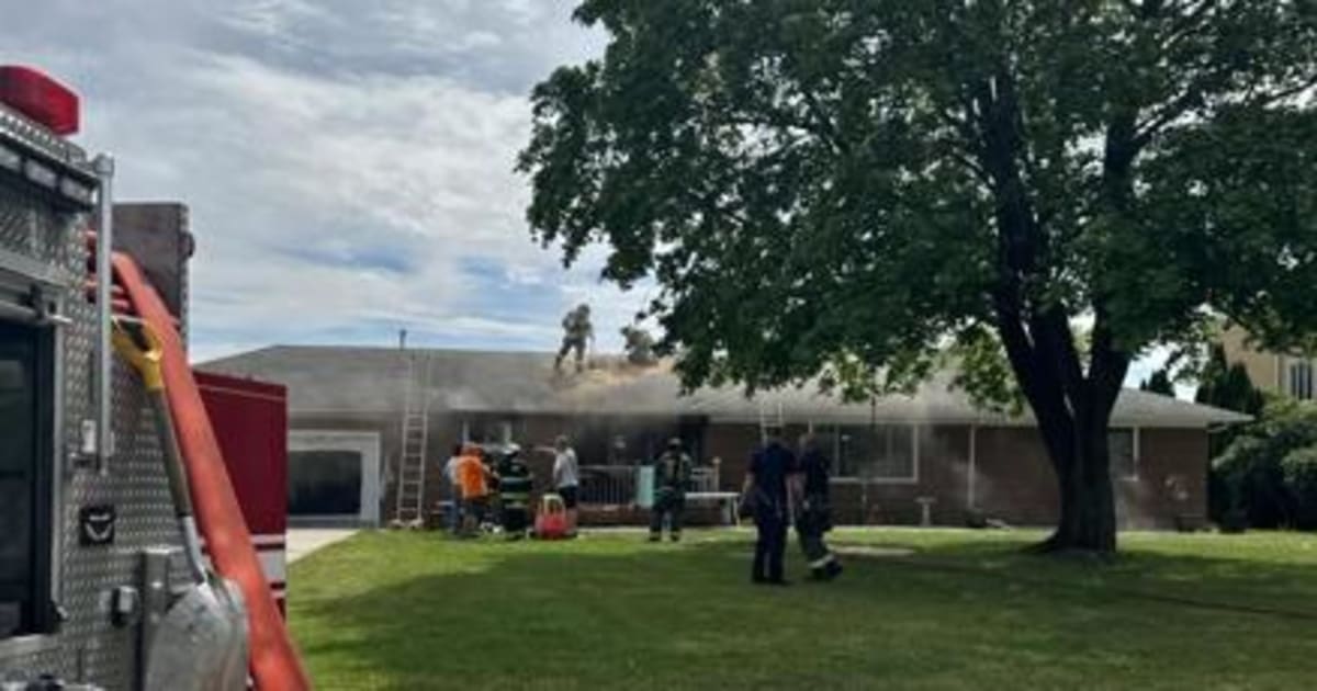 Officer and Neighbor Save Five Trapped in House Fire - Image 2