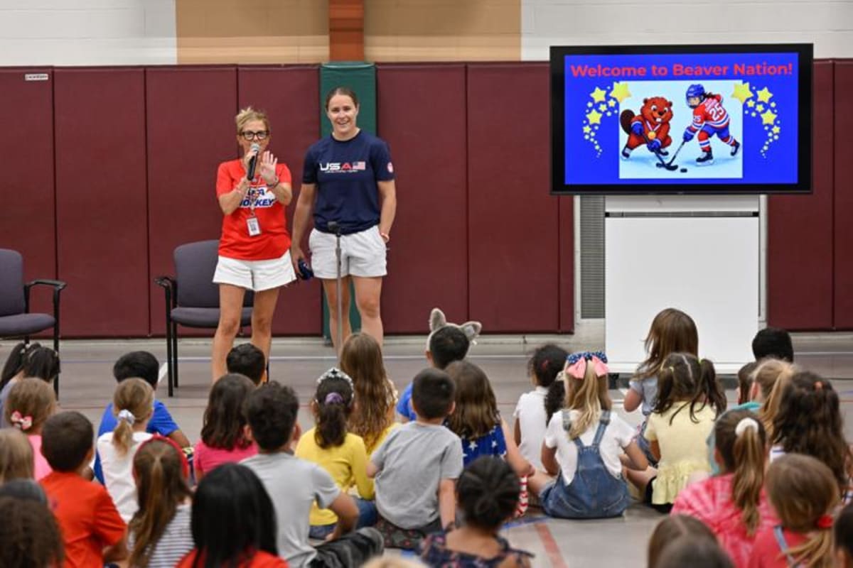 Olympic Gold Medalist Brings Medals to Beverly School - Image 3