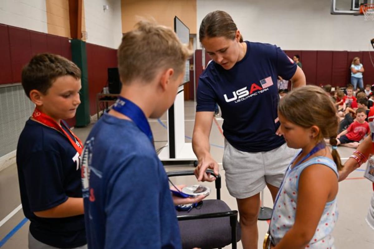 Olympic Gold Medalist Brings Medals to Beverly School - Image 2